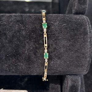482951 10k yg Emerald bracelet.